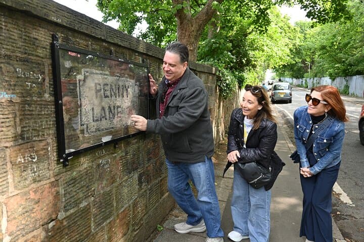 The Paul and James shot at Penny Lane, at the only remaining roadsign that was embedded into the wall away from memorabillia hunters.