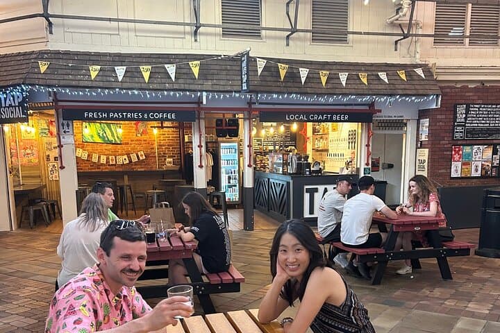 Recent guests enjoying the locally brewed beer at the Market tap.