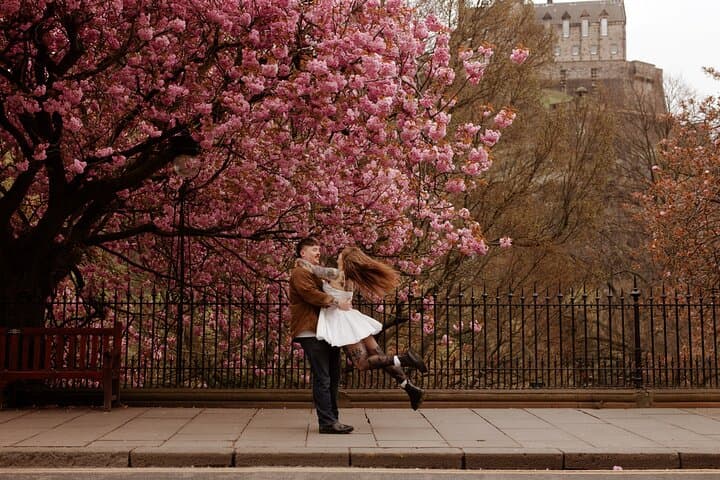 Pre wedding photo shoot, Princes street, Edinburgh, couple in love