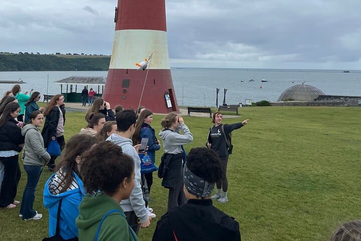 Pointing out features on the horizon to a secondary school group