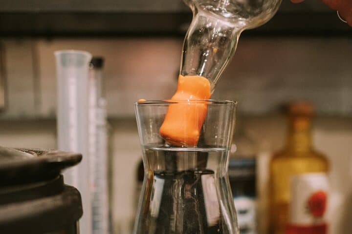 Distill a bottle of Gin on mini copper stills