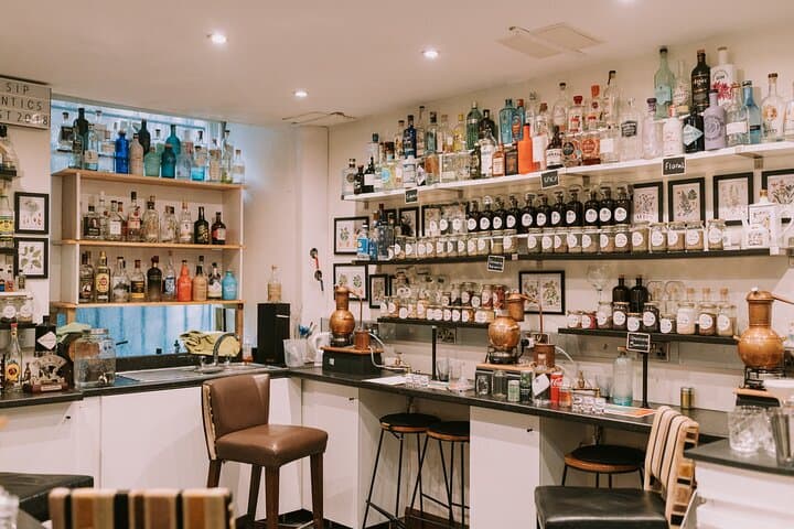 Distill a bottle of Gin on mini copper stills