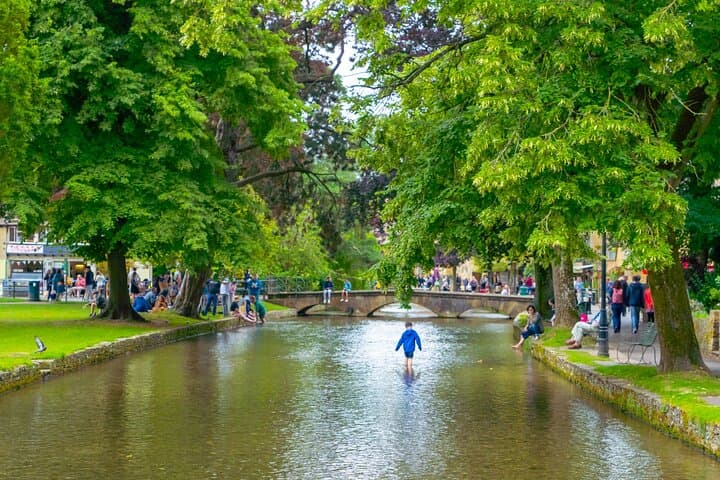 The pretty river Windrush is the centre of village life in Bourton-on-the-Water