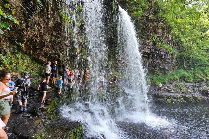 Walking under the falls