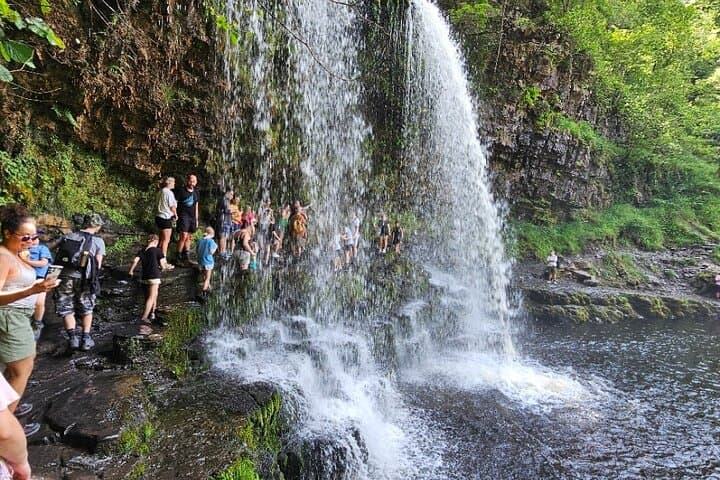 Walking under the falls