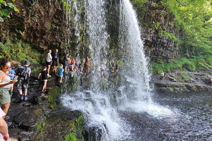 Walking under the falls