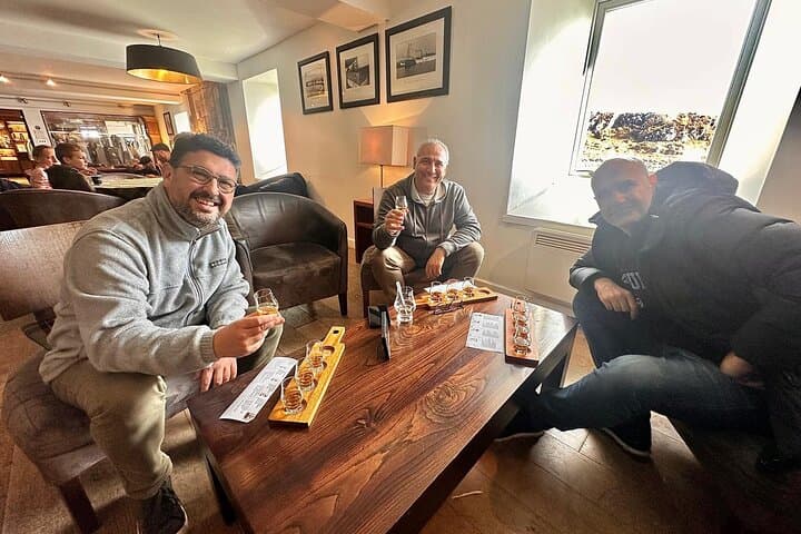 enjoying a whisky flight at a tasting bar