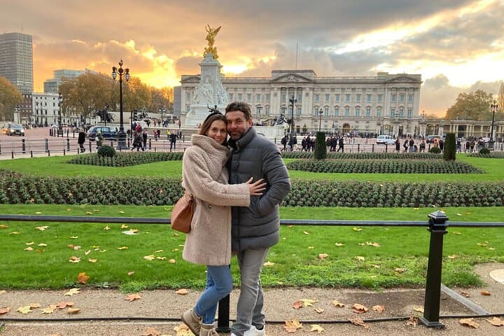 Guests at an atmospheric Buckingham Palace.