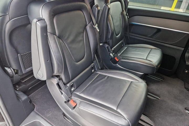 Enjoy the comfort and privacy of two rear captain chairs in the Mercedes-Benz V-Class, designed for executive travel in style.