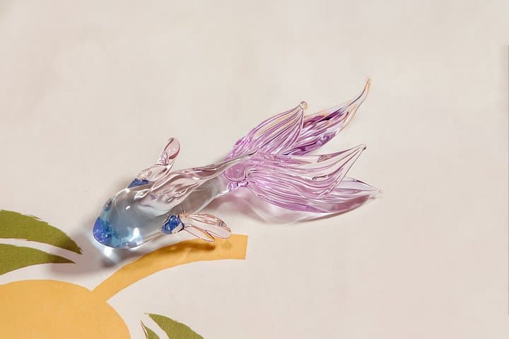 Glass goldfish pendant created in the studio.