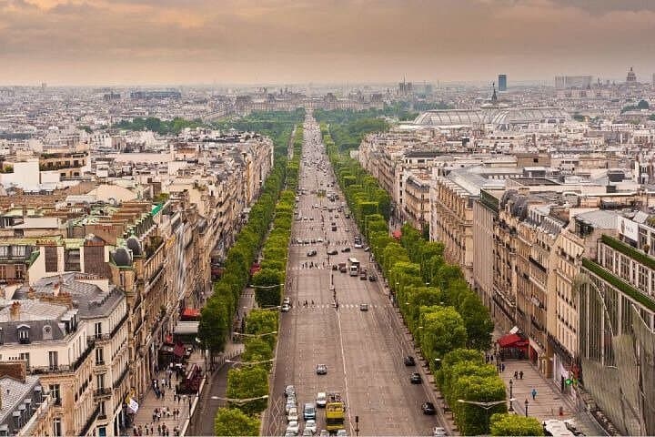 Escorted Paris Day Trip: Eiffel Tower, Notre Dame & Lunch Cruise