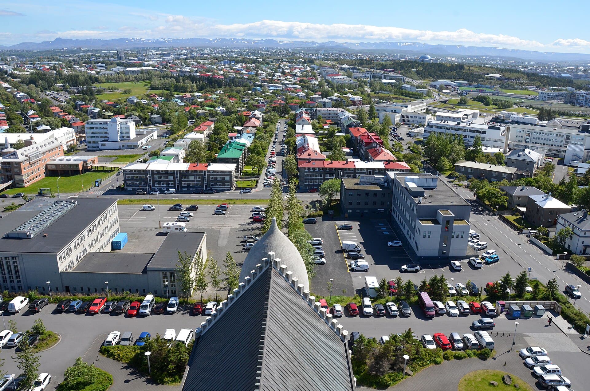 Colourful corrugated rooftops of Reykjavík looking out to the harbour from Hallgrímskirkja