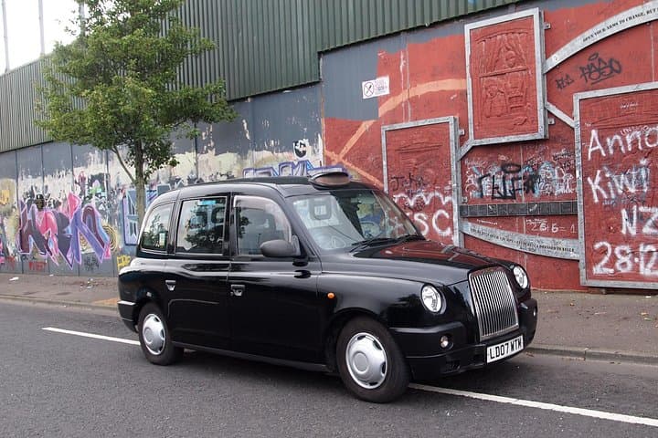 Black Taxi Mural "Tour Like A Local"