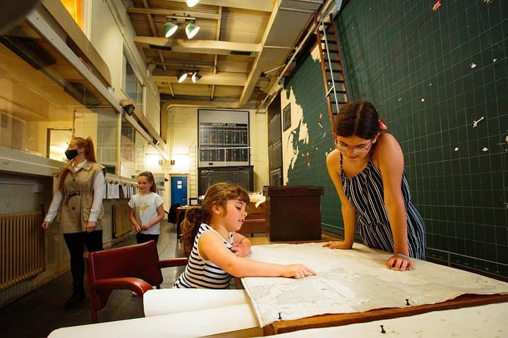 The iconic Map Room where you can sit at the desks and explore the offices used by staff during WW2. The room was the computer of the day and helped to protect the Atlantic Ocean from attack