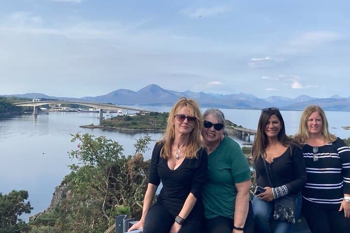 Capture the magic — panoramic views over Skye Bridge & the Cuillin Mountains.