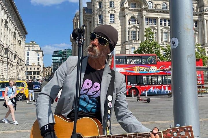 Every day is a day for a song in Liverpool.